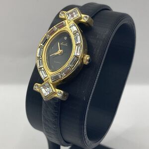 Vintage Moulin Gold Tone Crystal Bezel Gold Tone Ladies Watch Black Leather Band
